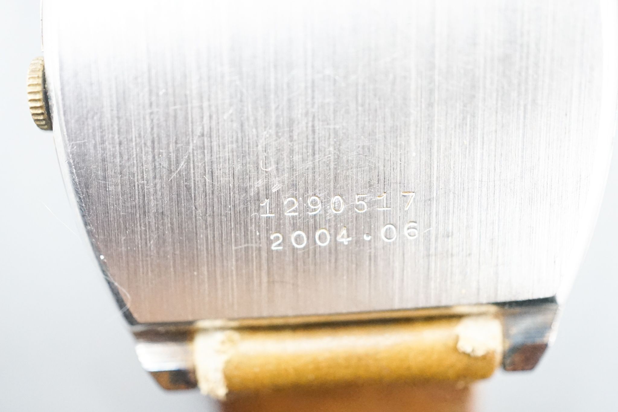 A gentleman's stainless steel Jaeger LeCoultre Club manual wind wrist watch, on associated strap, case diameter 32mm.